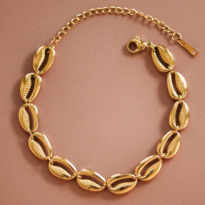 Cowrie Shell Bracelet - 18k gold
